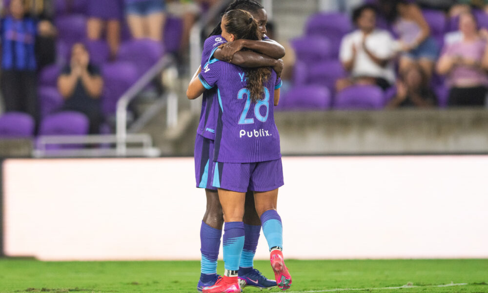 Image of Barbra Banda and Summer Yates celebrating a goal against Utah.