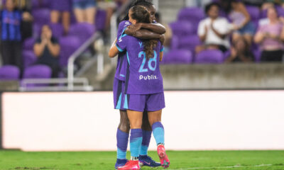 Image of Barbra Banda and Summer Yates celebrating a goal against Utah.