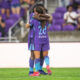 Image of Barbra Banda and Summer Yates celebrating a goal against Utah.
