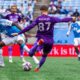 Image of Marco Pasalic trying to fire a shot through traffic against Charlotte.