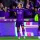 Image of Antoine Griezmann celebrating with fans and Daryl Dike.