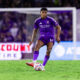 Image of Wilder Cartagena playing the ball.