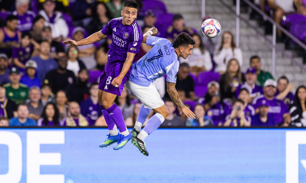 Image of Braian Ojeda leaping for an aerial ball against New York City FC