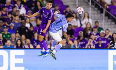 Image of Braian Ojeda leaping for an aerial ball against New York City FC