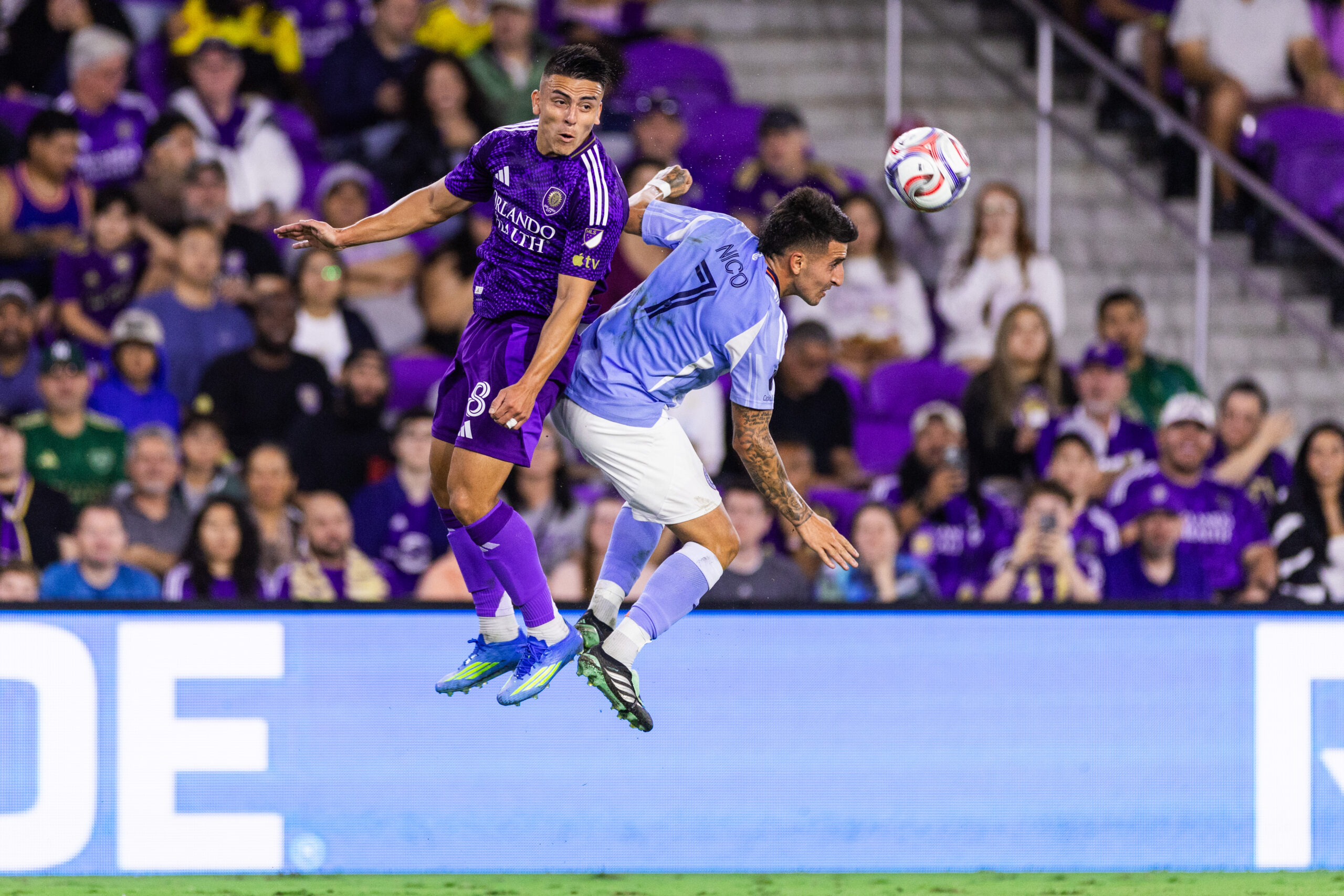 Image of Braian Ojeda leaping for an aerial ball against New York City FC