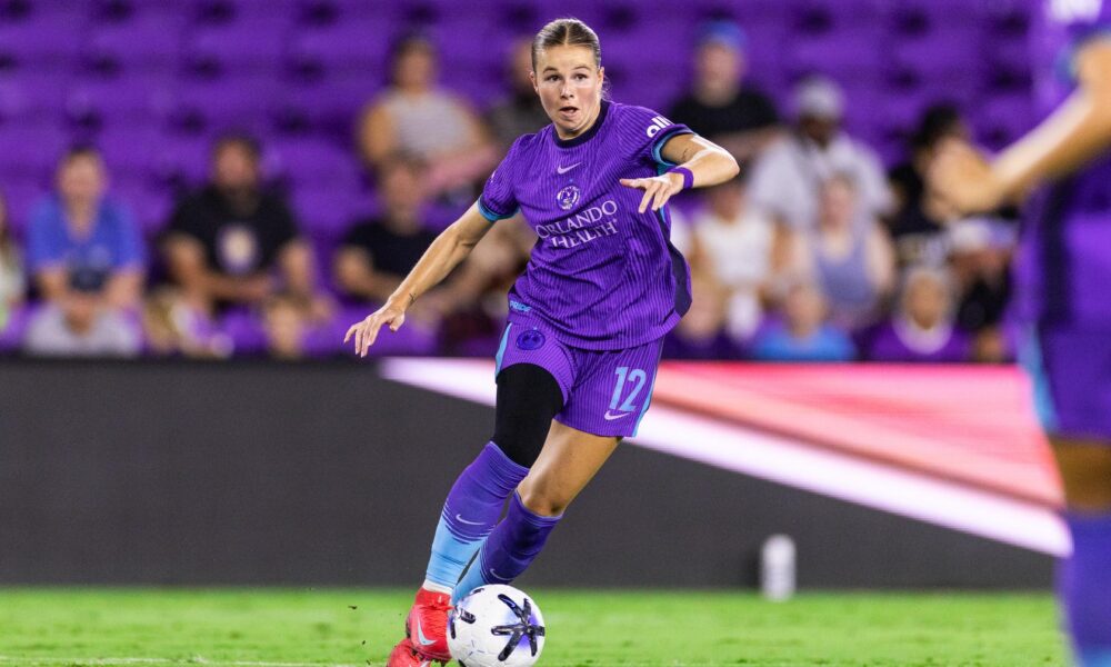 Image of Cory Dike playing the ball.