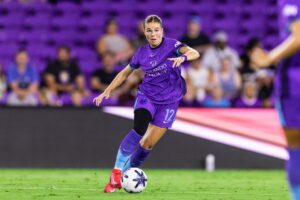 Image of Cory Dike playing the ball.