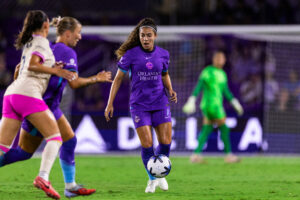 Image of Angelina on the ball against San Diego.