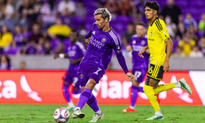 Image of Antoine Griezmann sending a pass through the Columbus defense.
