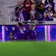 Image of Martin Ojeda and Antoine Griezmann celebrating a goal together.