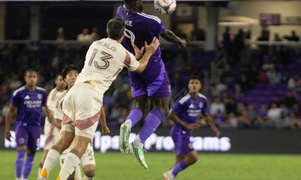 Image of Daryl Dike bringing down an aerial ball against D.C. United.