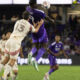 Image of Daryl Dike bringing down an aerial ball against D.C. United.