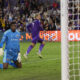 Image of Antoine Griezmann celebrating his goal against D.C. United as Sean Johnson reacts.