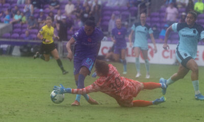 Marta tries to round Gotham's Ann-Katrin Berger.