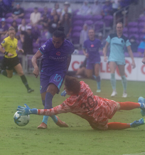 Marta tries to round Gotham's Ann-Katrin Berger.