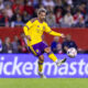 Image of Antoine Griezmann sending a pass forward.